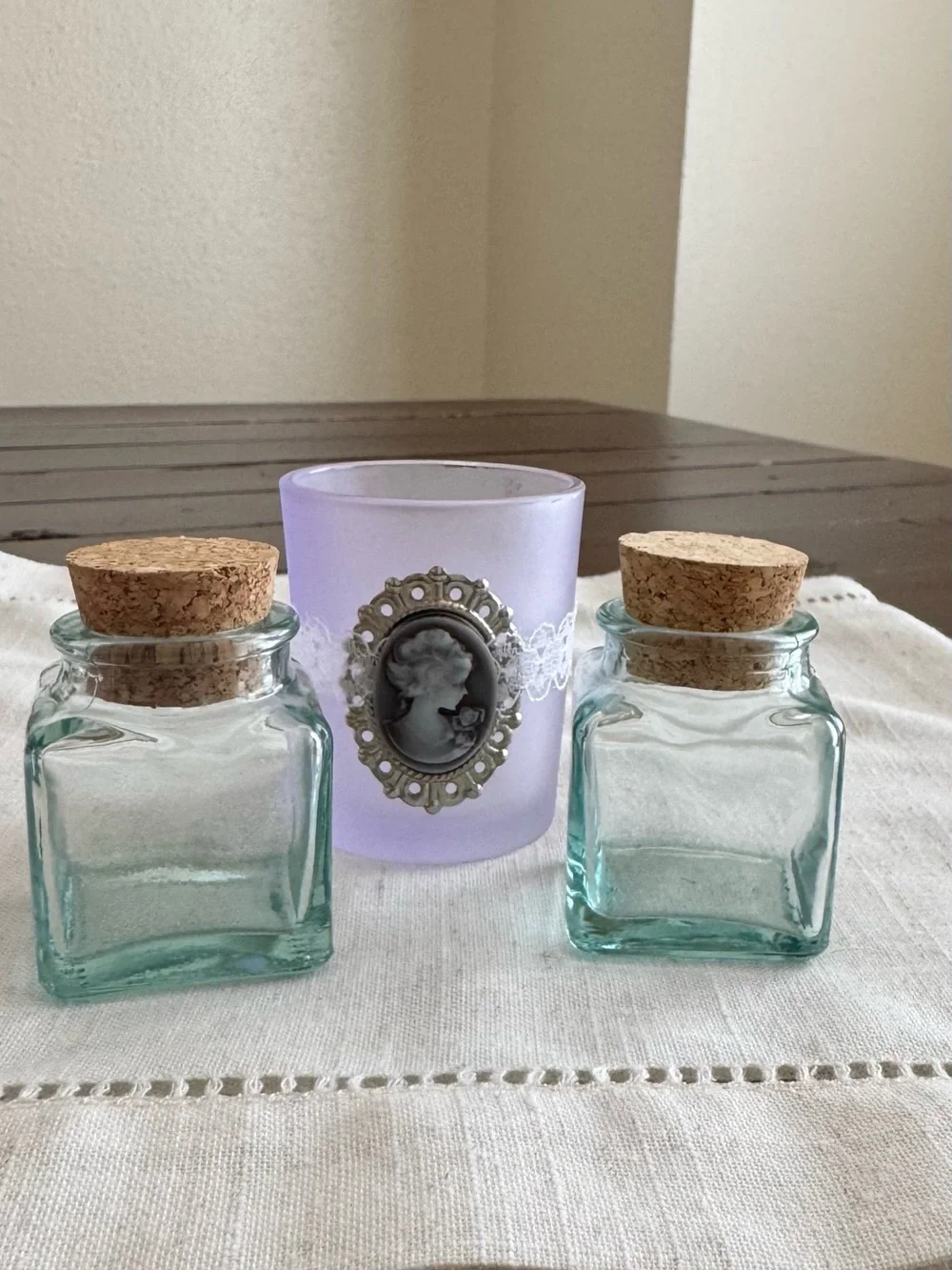 Set of 2 Mini Glasses Jars and 1 Votive Candle Holder.